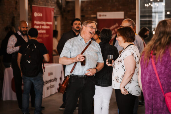 Two people smiling at Canadians Connected: Edmonton