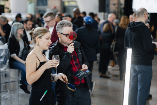 Two people looking at art
