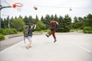 Moose plays basketball with backpackers