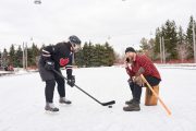 Lumberjack takes a call before the big game