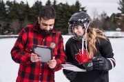 Hockey player and lumberjack prepare for presentation