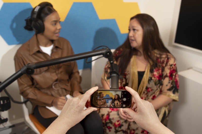 Video broadcasting female podcasters